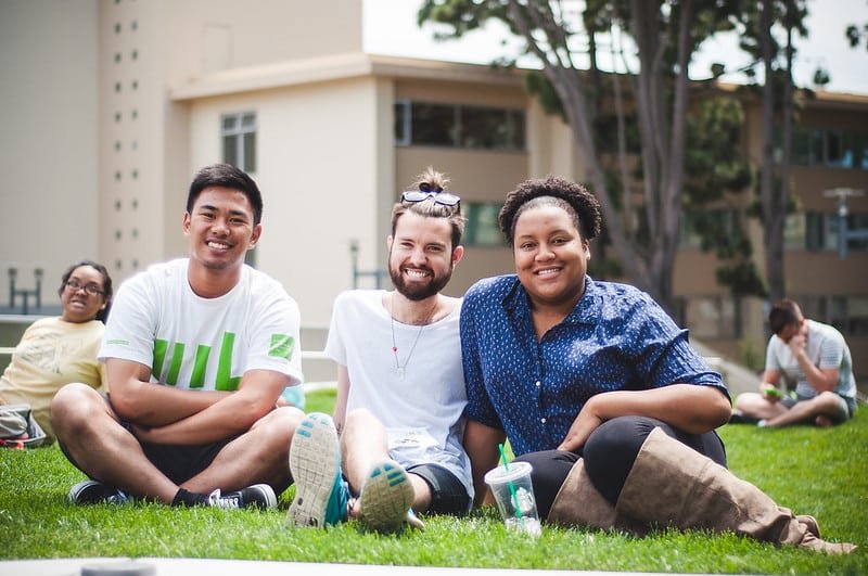 college students sitting outside