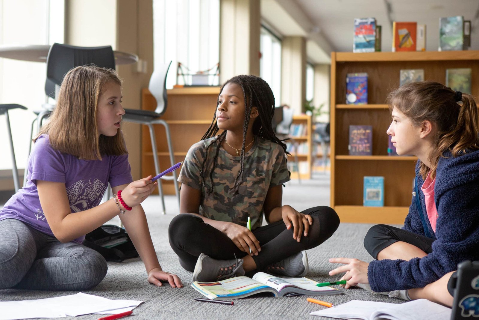Middle school girls in library
