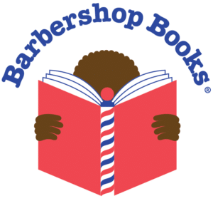 Silhouette of little boy reading a book